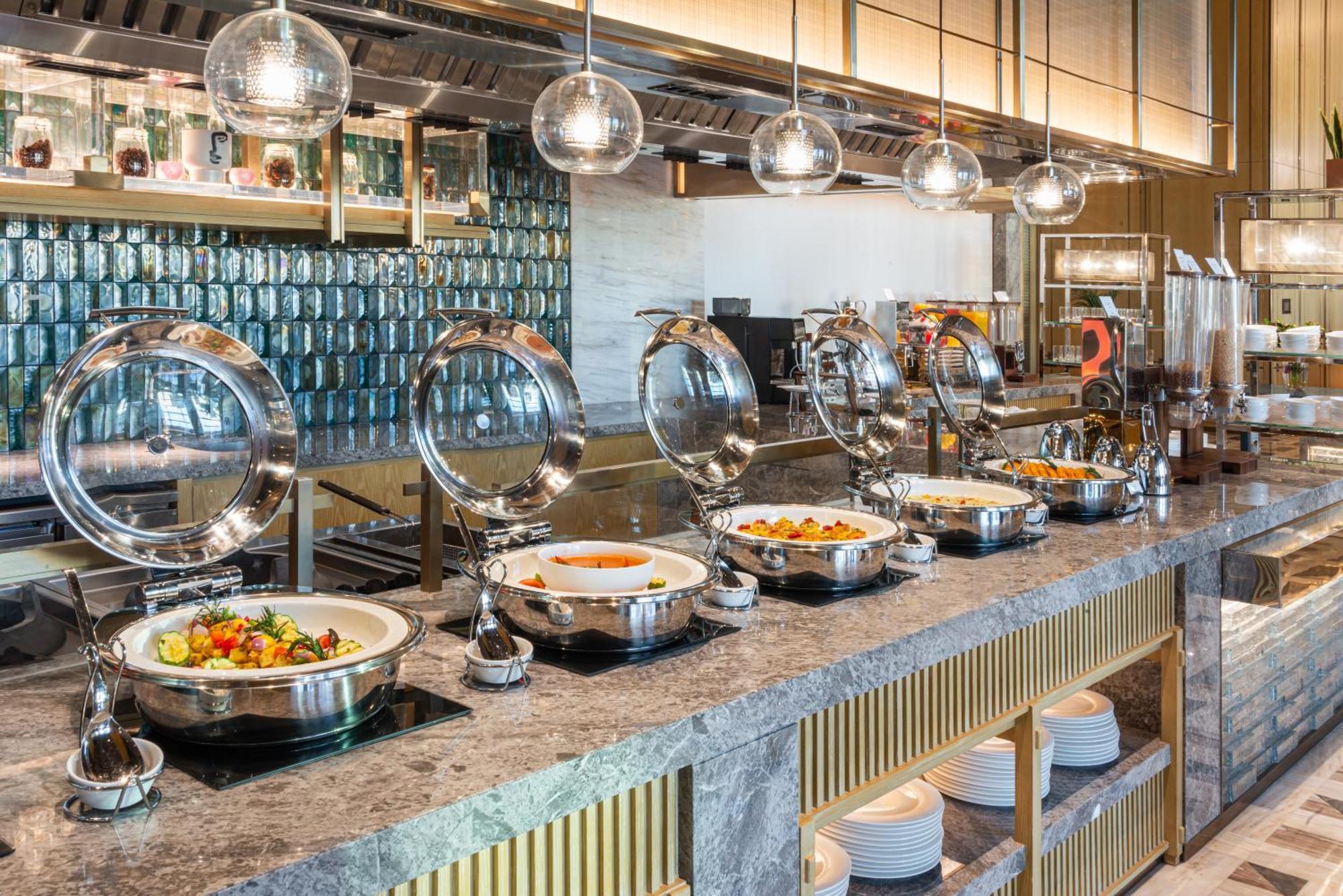 Narcissus The Royal Hotel Riadh Exterior foto A buffet at a hotel